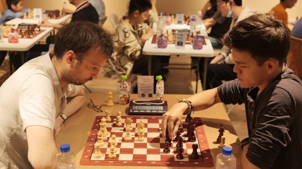 Coach Joseph Jimenez competing in a live chess tournament
